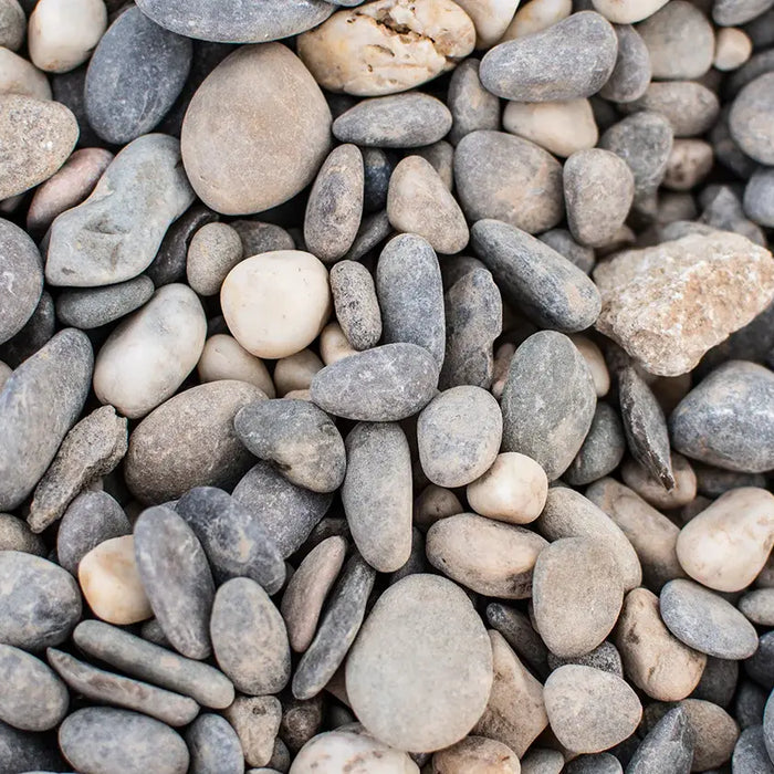 Creating Rustic Elegance: Working with Cobble Rocks for Distinctive Landscape Designs