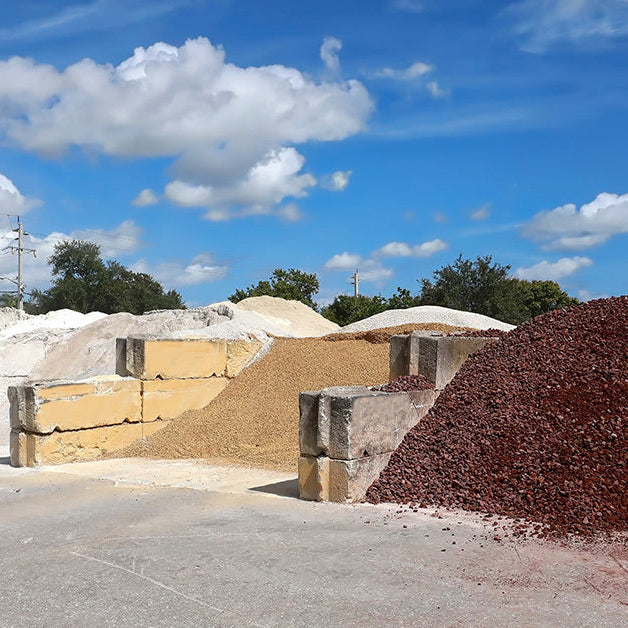 bins of gravel and landscape materials