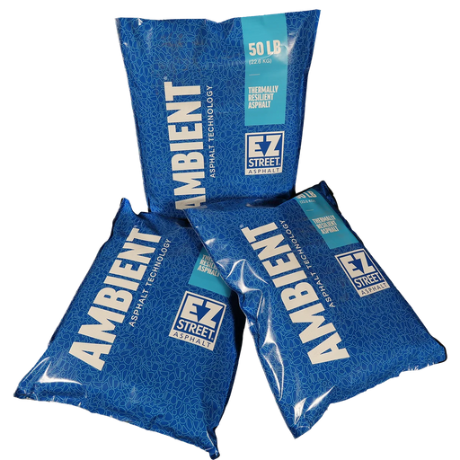 Three bags of EZ Street Ambient Asphalt on a white background