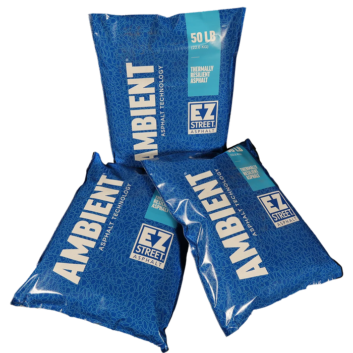 Three bags of EZ Street Ambient Asphalt on a white background