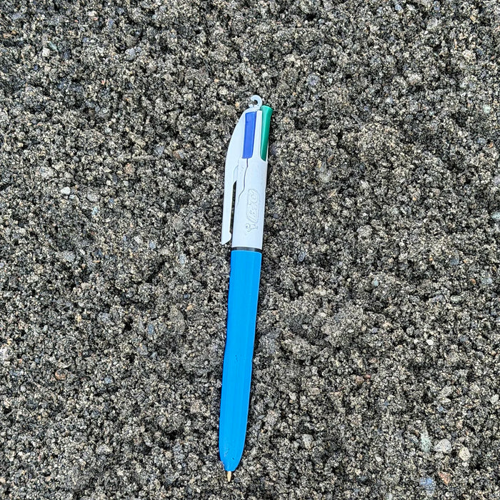 paver sand with a pen on top for scale